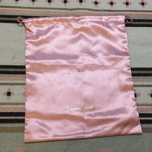 Amina Muaddi medium satin & gold drawstring dustbag